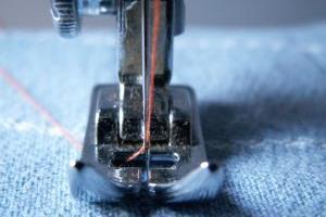 Close-up on a sewing machine in action
